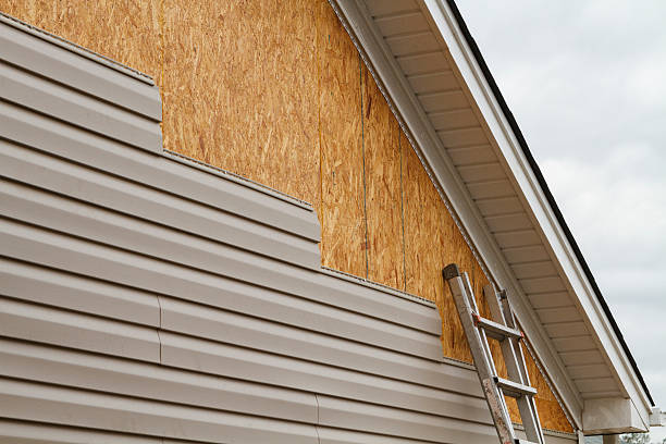 Professional Emergency Siding Repair technician working in Arvada, CO